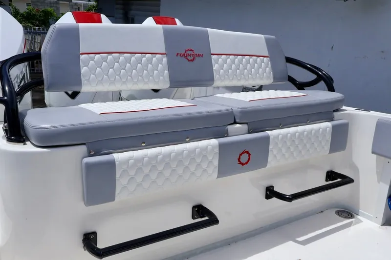 Slide: The Image of 2023 Fountain 34 Tournament Edition boat seating with stylish gray and white upholstery. - 3