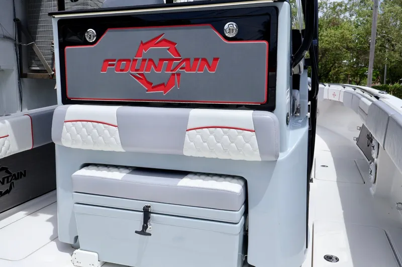 Slide: The Image of 2023 Fountain 34 Tournament Edition boat interior with branded seating and storage. - 4