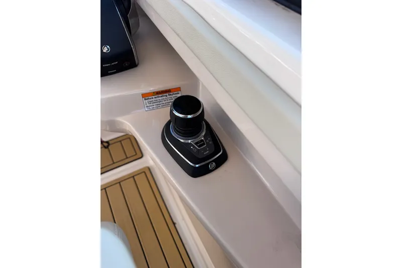 Slide: The Image of Joystick control on 2022 Boston Whaler 280 Vantage boat, featuring sleek design and advanced technology. - 29
