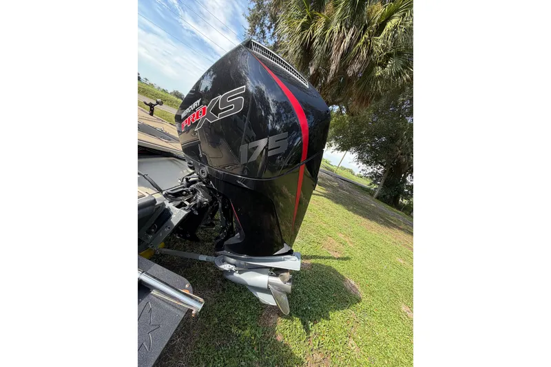 Slide: The Image of 2025 Mako 18 Pro Skiff Backwater Edition with Mercury Pro XS outboard motor. - 11