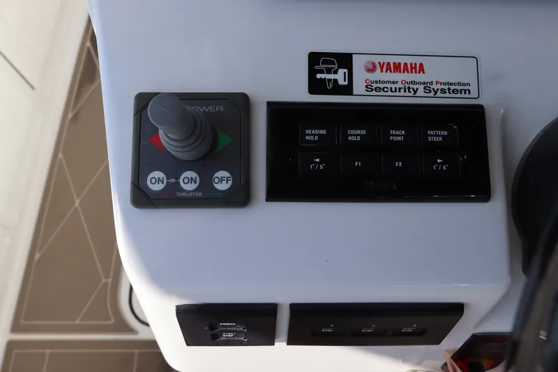 Slide: The Image of Control panel of a 2021 Edgewater 370CC boat with Yamaha security system. - 34