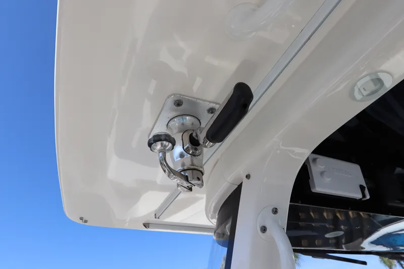 Slide: The Image of Close-up of 2021 Edgewater 370CC boat hardware against a clear blue sky. - 51