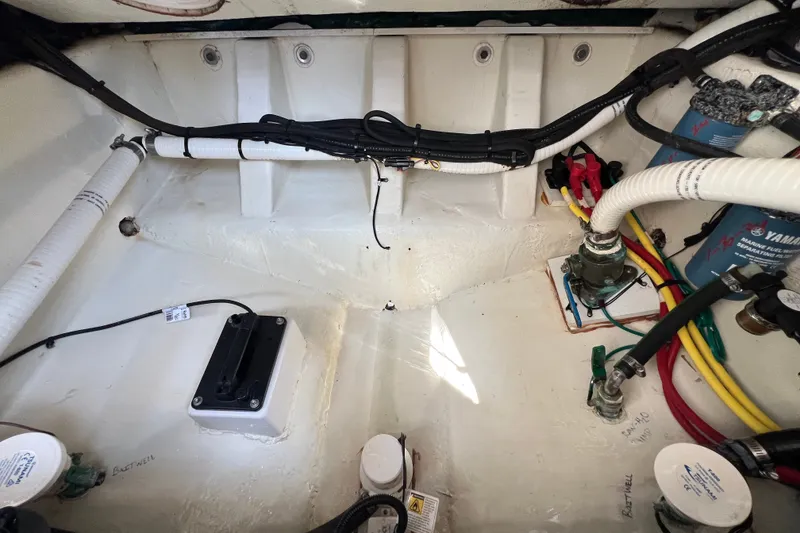 Slide: The Image of 2018 Wellcraft 302 Fisherman boat interior wiring and plumbing setup. - 31
