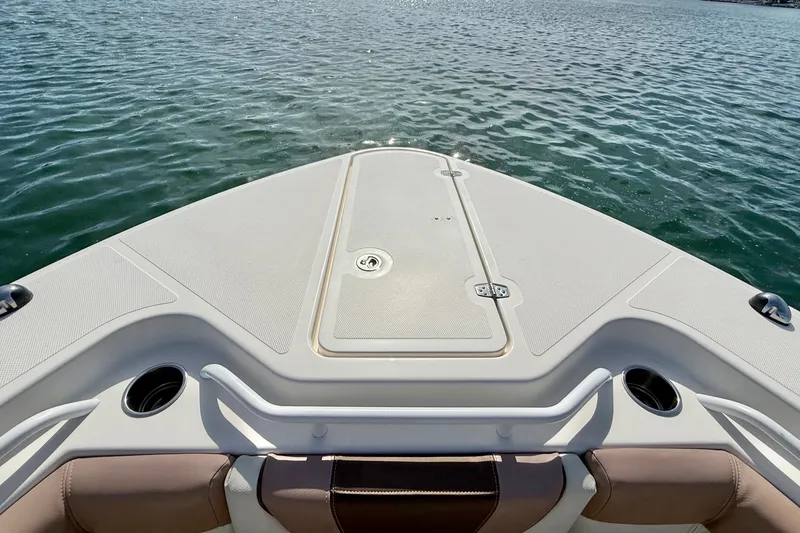 Slide: The Image of Bow view of 2018 Wellcraft 302 Fisherman boat on water. - 15