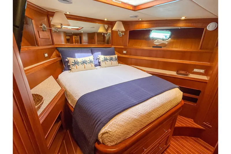 Slide: The Image of Luxurious cabin interior of 2003 Grand Banks 64 Aleutian RP yacht with elegant wood finish. - 52