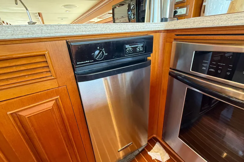Slide: The Image of KitchenAid dishwasher and oven in 2003 Grand Banks 64 Aleutian RP yacht kitchen. - 17