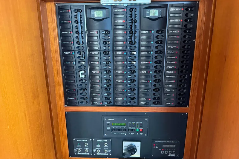 Slide: The Image of Electrical control panel on a 2003 Grand Banks 64 Aleutian RP yacht. - 85