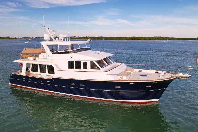 The Image of 2003 Grand Banks 64 Aleutian RP yacht cruising on calm waters. - 0