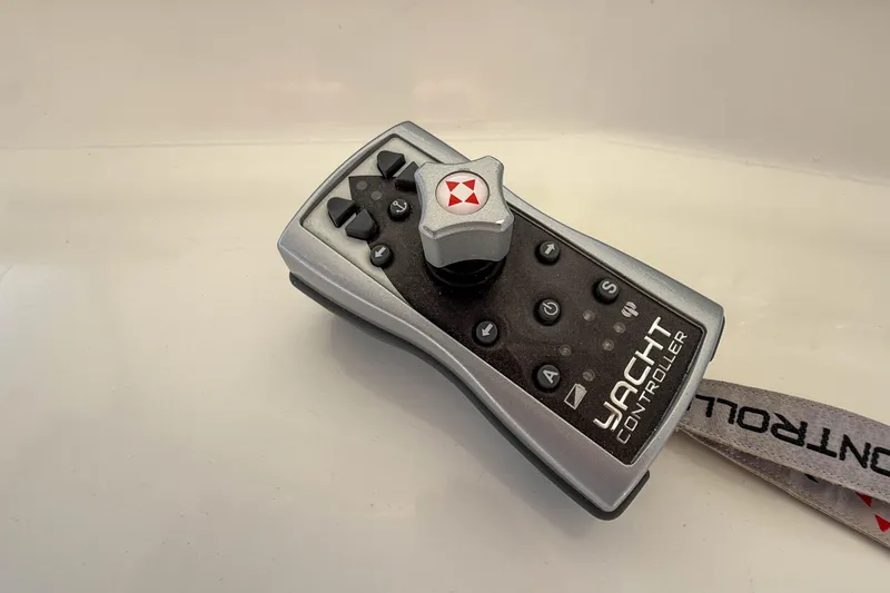 Slide: The Image of Remote yacht controller for 2003 Grand Banks 64 Aleutian RP, featuring joystick and buttons. - 32