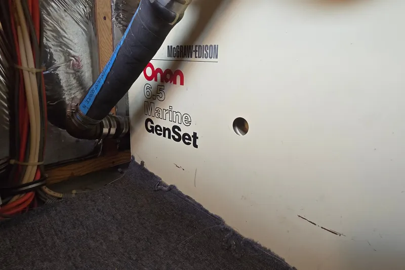 Slide: The Image of Onan 6.5 Marine GenSet in 1984 Bertram 42 Flybridge Motor Yacht engine room. - 46