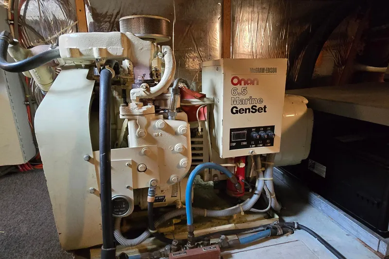 Slide: The Image of Onan 6.5 Marine GenSet in 1984 Bertram 42 Flybridge Motor Yacht engine room. - 49
