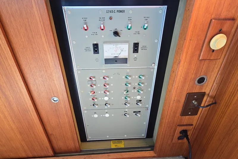 Slide: The Image of Electrical control panel on a 1984 Bertram 42 Flybridge Motor Yacht. - 43