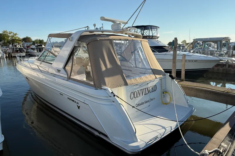 Slide: The Image of 2000 Formula 41 Performance Cruiser docked at marina, rear view. - 1