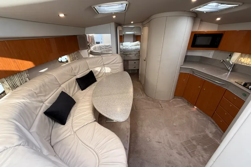 Slide: The Image of Luxurious interior of a 2000 Formula 41 Performance Cruiser with plush seating and modern amenities. - 35