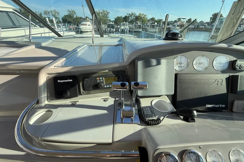 Slide: The Image of Cockpit of 2000 Formula 41 Performance Cruiser with Raymarine navigation equipment. - 26