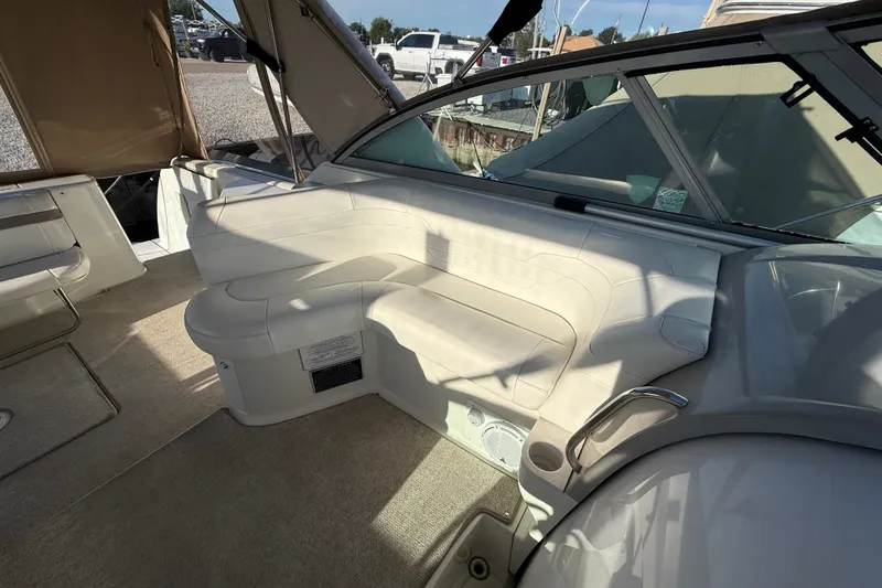 Slide: The Image of Interior of a 2000 Formula 41 Performance Cruiser with beige seating and carpet. - 19