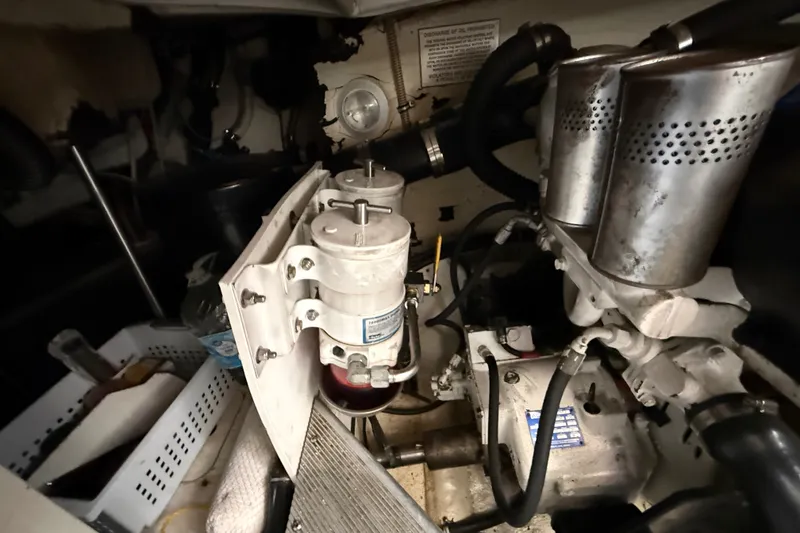Slide: The Image of Engine compartment of a 2000 Formula 41 Performance Cruiser, showcasing mechanical components. - 62
