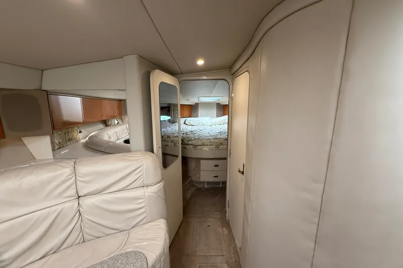 Slide: The Image of Interior of 2000 Formula 41 Performance Cruiser with cozy seating and bed. - 48