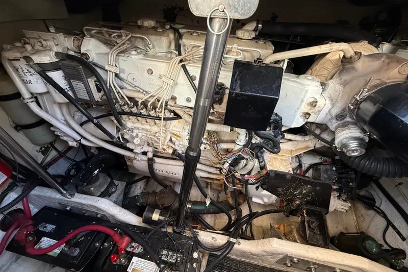 Slide: The Image of Engine compartment of a 2000 Formula 41 Performance Cruiser with visible wiring and components. - 60