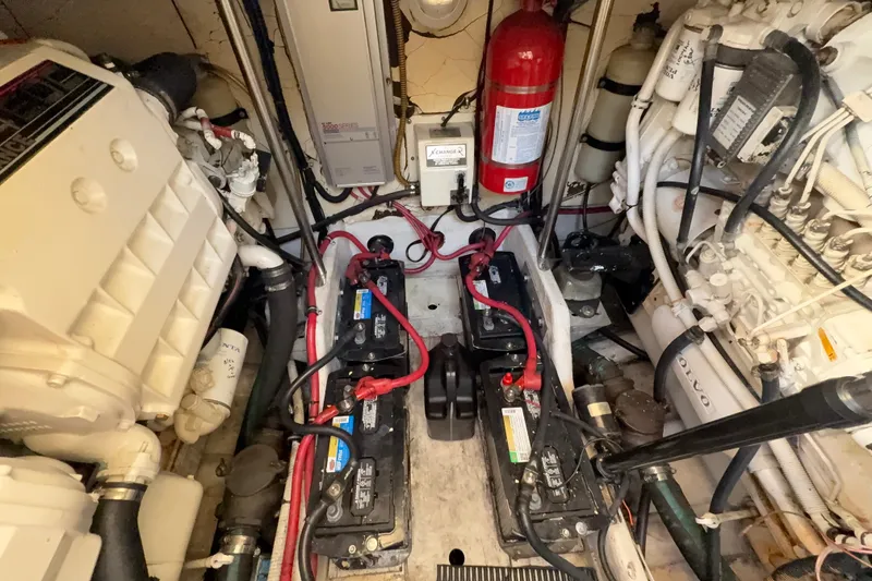 Slide: The Image of Engine room of a 2000 Formula 41 Performance Cruiser with batteries and fire extinguisher. - 59