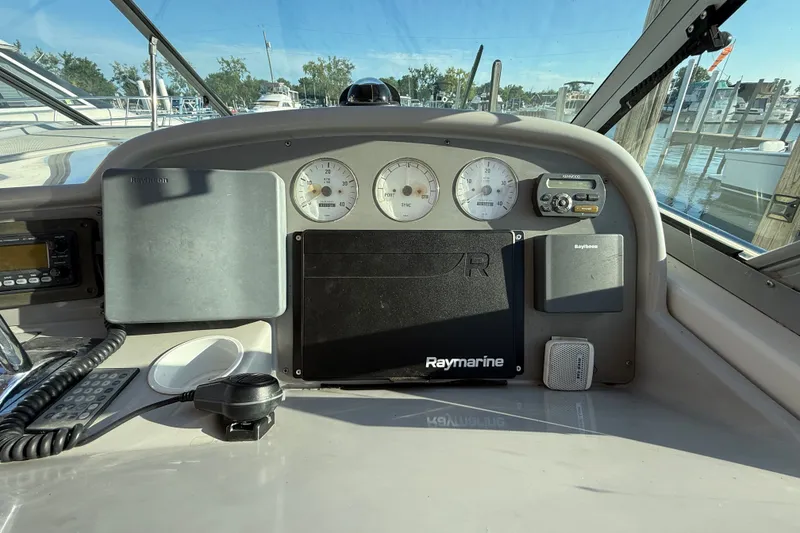 Slide: The Image of Control panel of a 2000 Formula 41 Performance Cruiser with Raymarine equipment. - 27