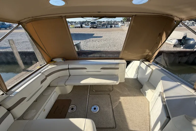 Slide: The Image of Interior of a 2000 Formula 41 Performance Cruiser with beige seating and carpet. - 12