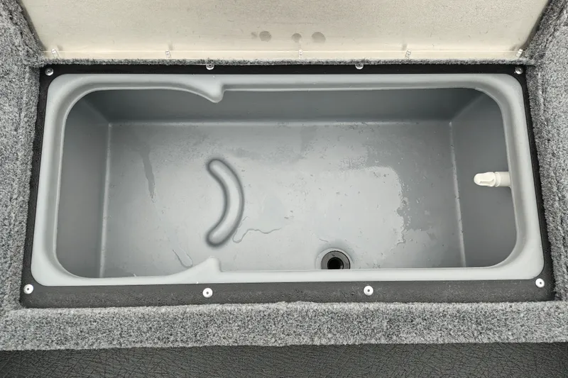 Slide: The Image of 2027 Tracker Super Guide V-16 T livewell, gray interior, partially filled with water. - 21