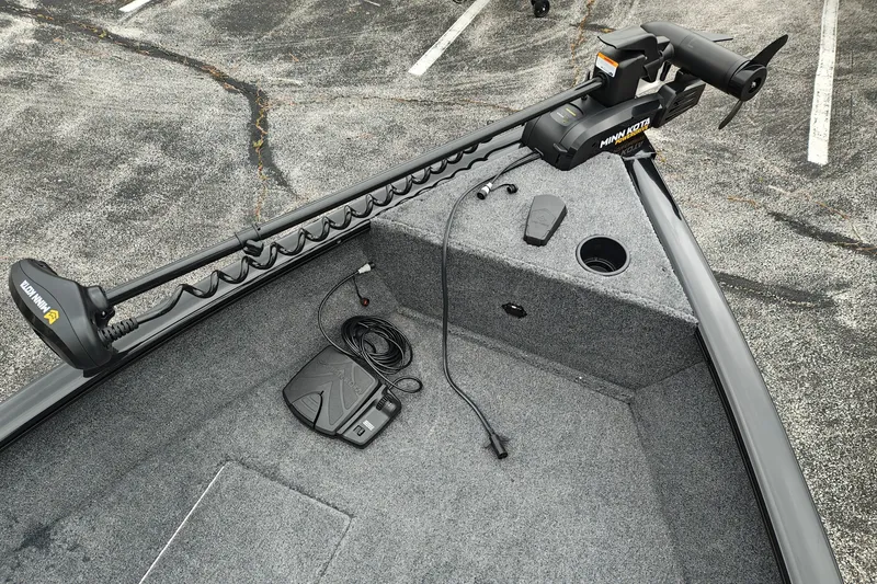 Slide: The Image of 2027 Tracker Super Guide V-16 T boat with Minn Kota trolling motor and foot pedal. - 23