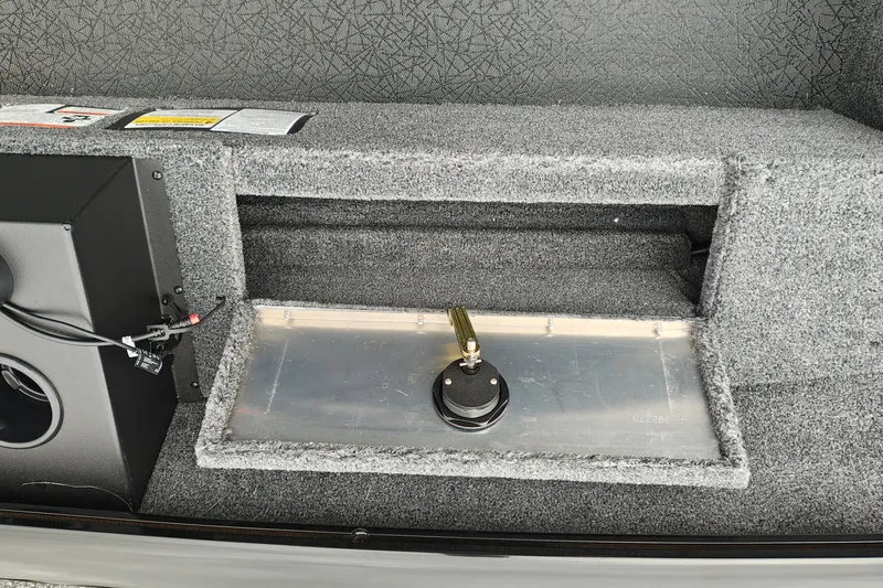 Slide: The Image of Interior view of 2027 Tracker Super Guide V-16 T boat storage compartment. - 18