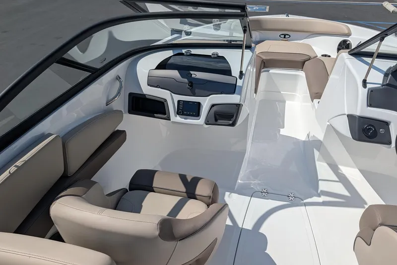 Slide: The Image of Interior of 2027 Tahoe 210 S boat, featuring sleek seating and modern dashboard design. - 8