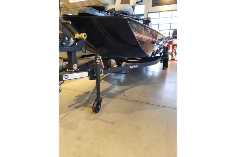 Slide: The Image of 2027 Tracker Bass Tracker Classic XL boat on display in showroom. - 13