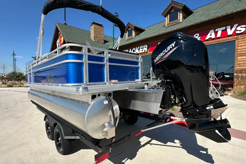 Slide: The Image of 2027 Sun Tracker SportFish 20 DLX pontoon boat with Mercury outboard motor on trailer. - 15
