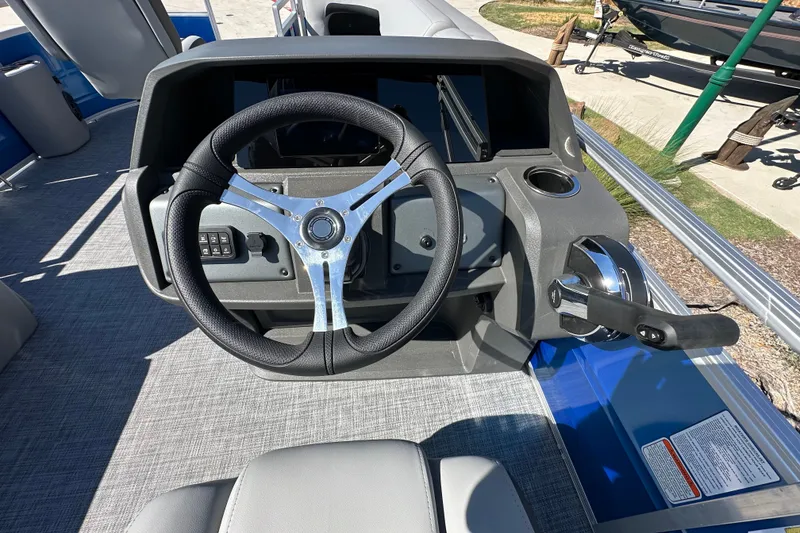 Slide: The Image of Steering console of 2027 Sun Tracker SportFish 20 DLX pontoon boat. - 20
