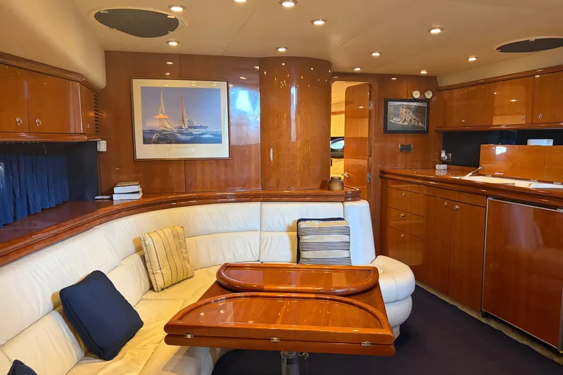 Slide: The Image of Luxurious interior of a 1997 Sunseeker Camargue 51 yacht with elegant wood finishes. - 27