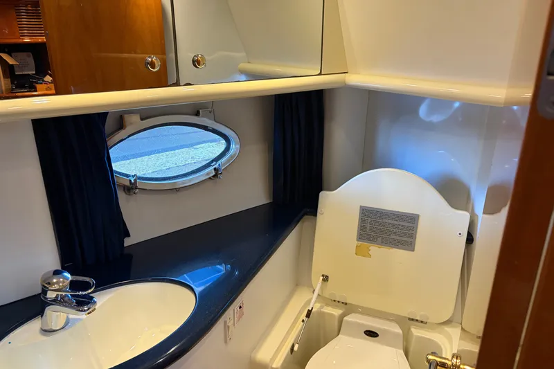 Slide: The Image of Bathroom interior of 1997 Sunseeker Camargue 51 yacht with sink and toilet. - 36