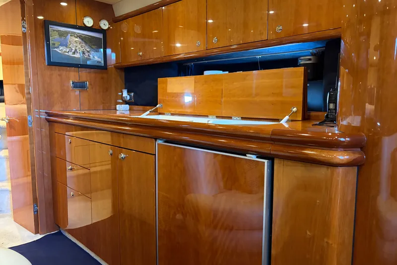 Slide: The Image of Luxurious wooden interior of 1997 Sunseeker Camargue 51 yacht kitchen area. - 33