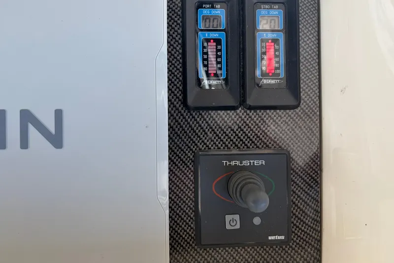 Slide: The Image of Control panel of a 1997 Sunseeker Camargue 51 yacht with thruster and tab indicators. - 19
