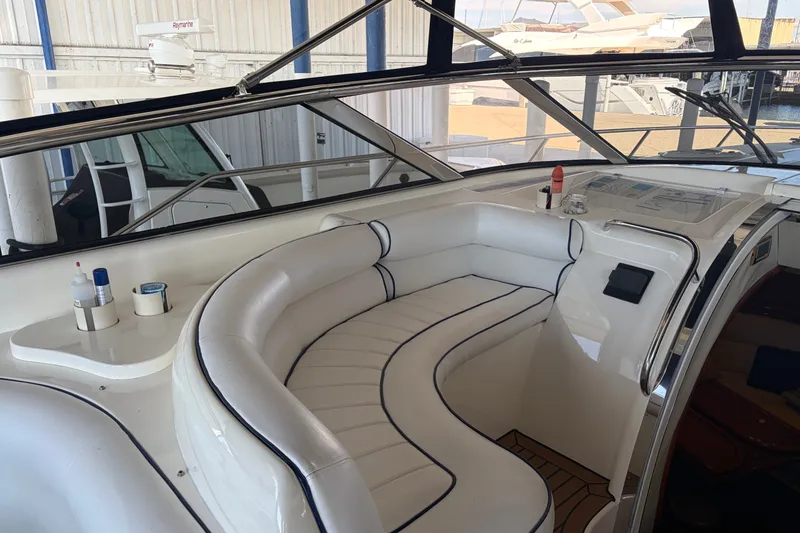 Slide: The Image of Luxurious 1997 Sunseeker Camargue 51 yacht interior with white leather seating. - 11
