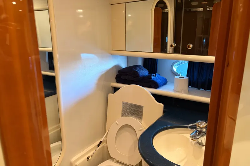 Slide: The Image of Bathroom interior of 1997 Sunseeker Camargue 51 yacht with sink and toilet. - 24