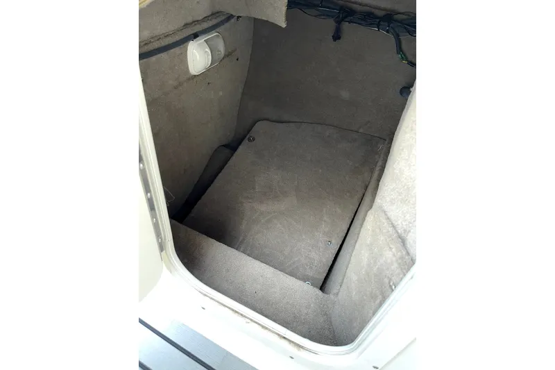 Slide: The Image of Interior storage compartment of 2004 Chaparral Sunesta 236 boat. - 15