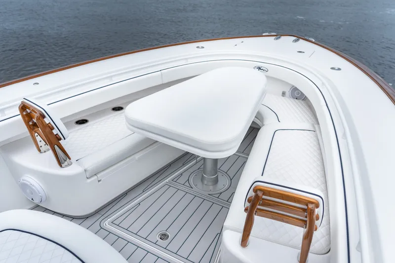 Slide: The Image of Luxurious seating area on 2026 Valhalla V-37 boat with elegant white upholstery. - 19
