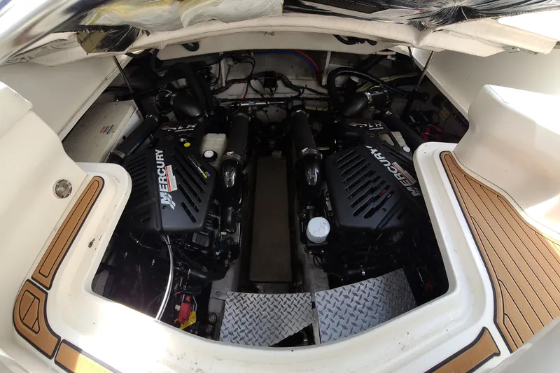 Slide: The Image of Engine compartment of a 2007 Sea Ray 38 Sundancer with twin Mercury engines. - 15