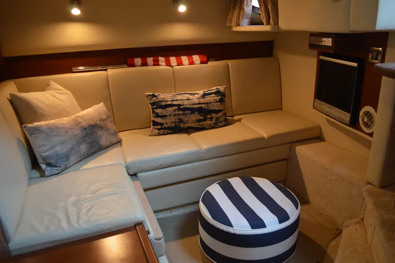 Slide: The Image of Luxurious interior of 2007 Sea Ray 38 Sundancer yacht with cozy seating and modern amenities. - 25