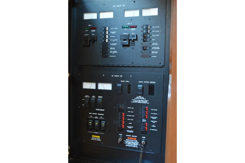 Slide: The Image of Electrical control panel on a 2007 Sea Ray 38 Sundancer boat. - 27