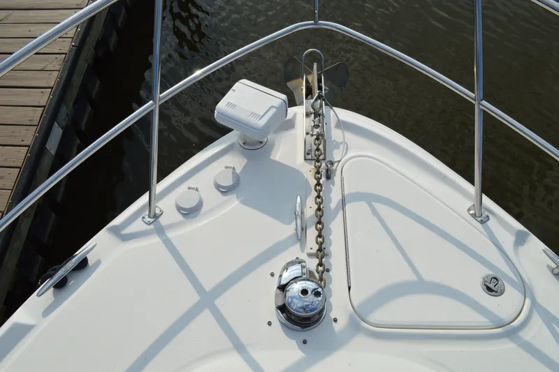 Slide: The Image of Bow of 2007 Sea Ray 38 Sundancer with anchor chain and railing. - 16