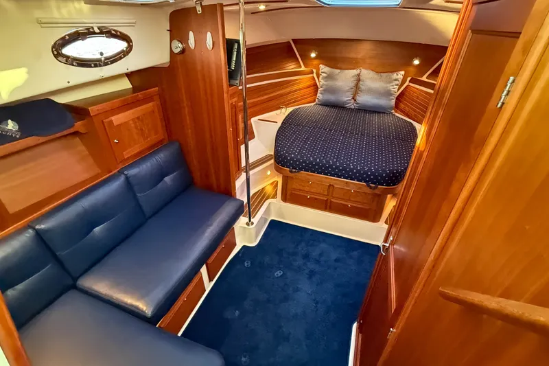 Slide: The Image of Luxurious cabin interior of 2016 Back Cove 34 yacht with cozy bed and seating. - 25
