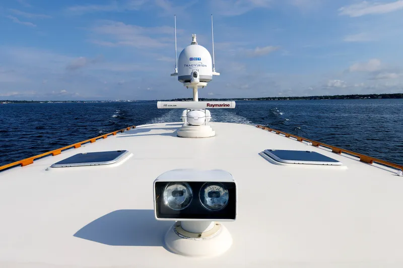 Slide: The Image of 2010 Vicem 64 yacht deck with radar and navigation equipment on open water. - 29
