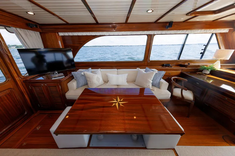 Slide: The Image of Luxurious 2010 Vicem 64 yacht interior with elegant wood finish and comfortable seating. - 54