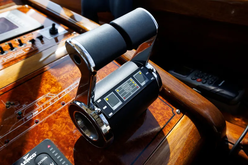 Slide: The Image of Throttle control on 2010 Vicem 64 yacht dashboard, featuring sleek design and modern instrumentation. - 65