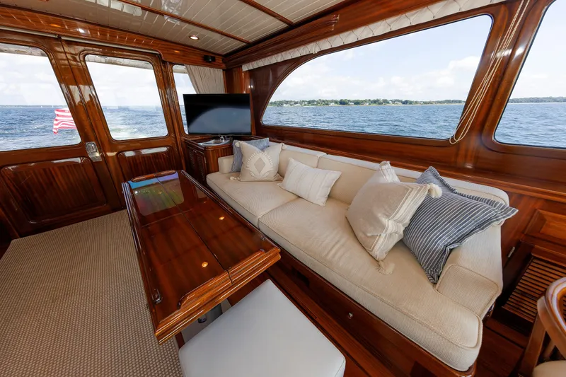 Slide: The Image of Luxurious interior of 2010 Vicem 64 yacht with elegant wood finish and comfortable seating. - 55